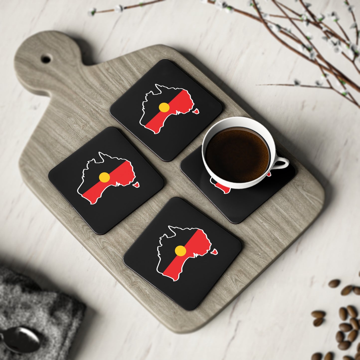 Black square Aboriginal coasters, 4-pack, Australia design in a home décor setting