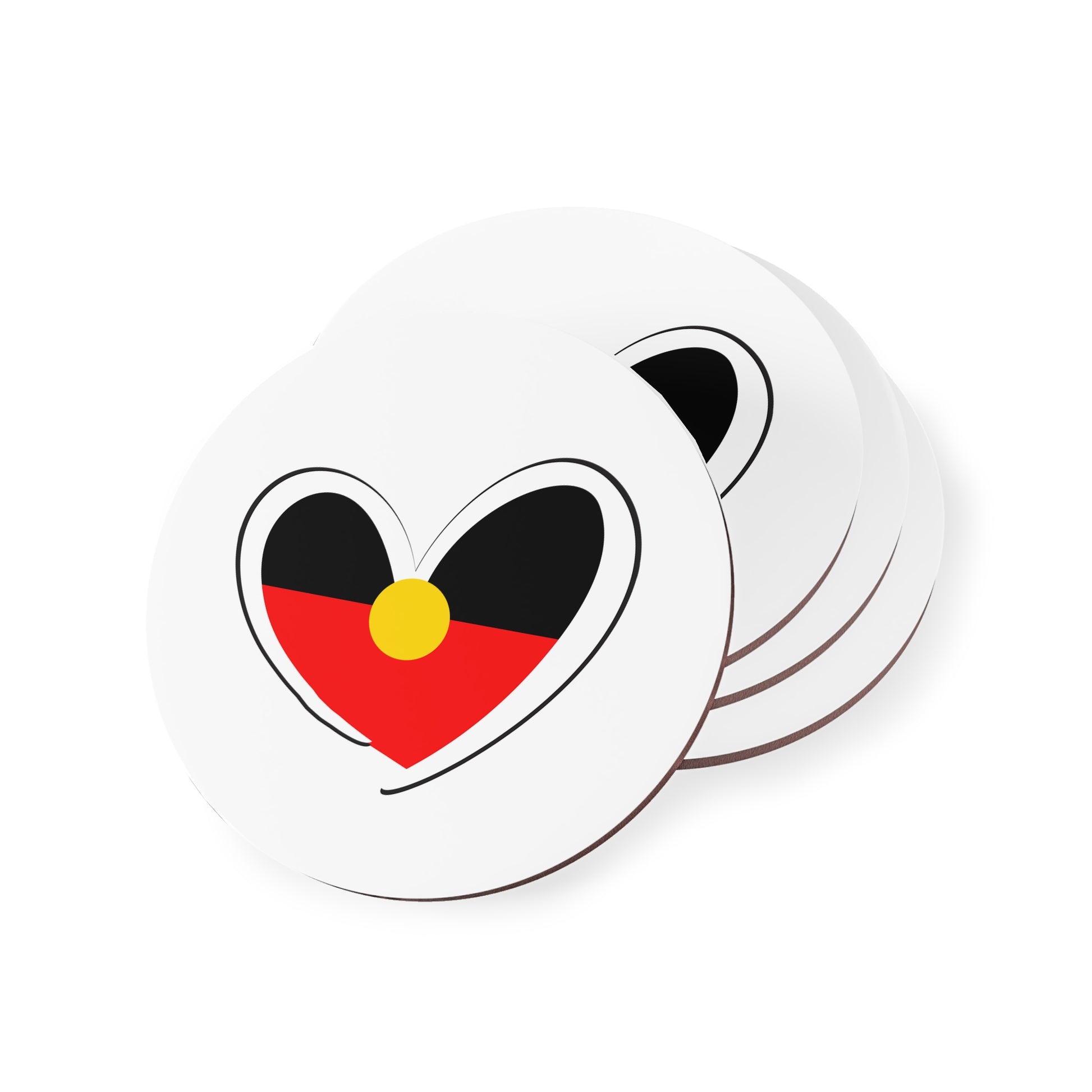 Set of four round white coasters featuring an Aboriginal heart design in black, red, and yellow.
