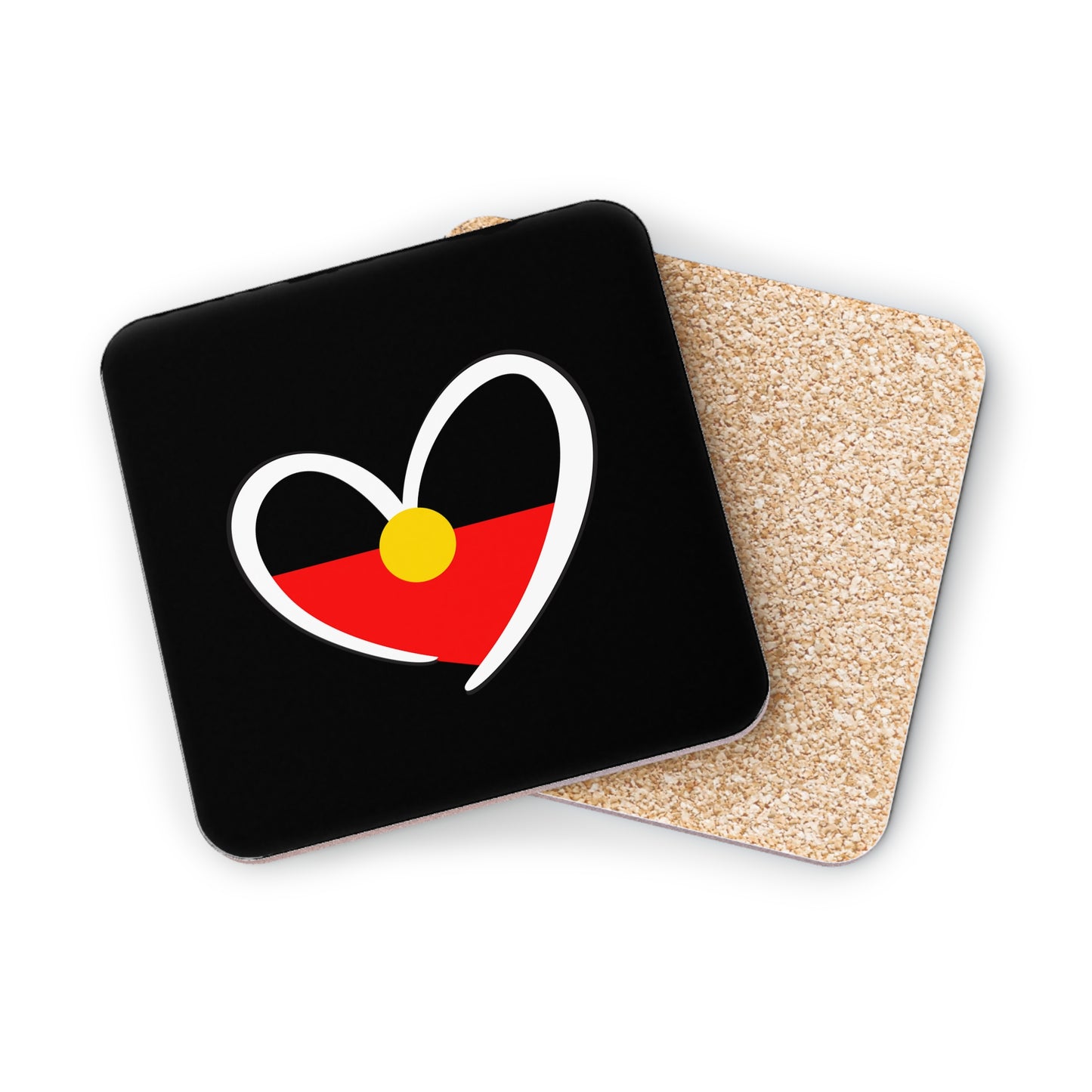 Square black coaster with Aboriginal heart design and cork base, styled flat lay.
