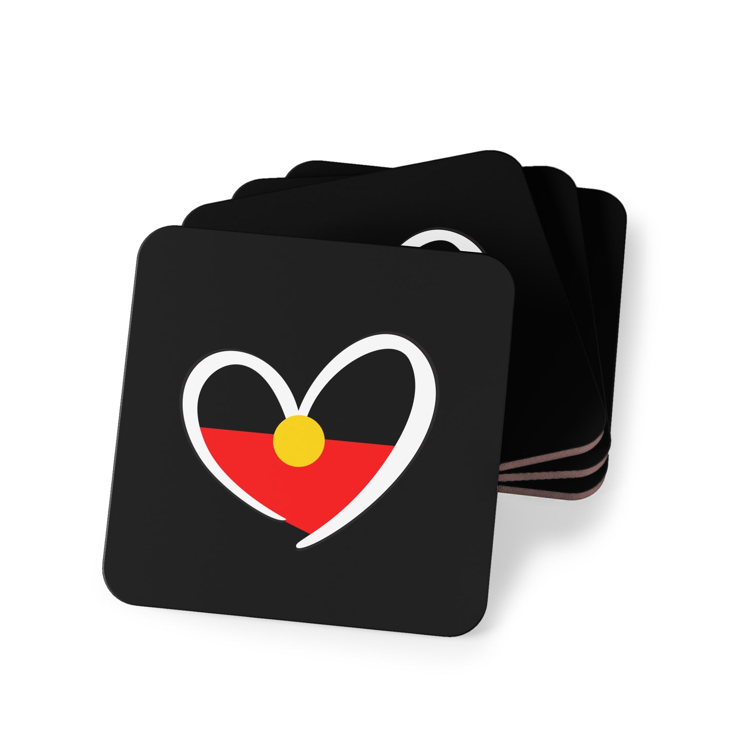 Stack of four square black coasters with Aboriginal heart design in red, black, and yellow.